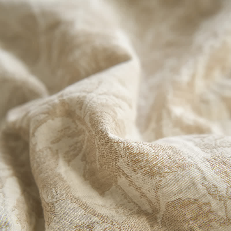 Linge de lit estival en gaze de coton avec un motif floral rustique
