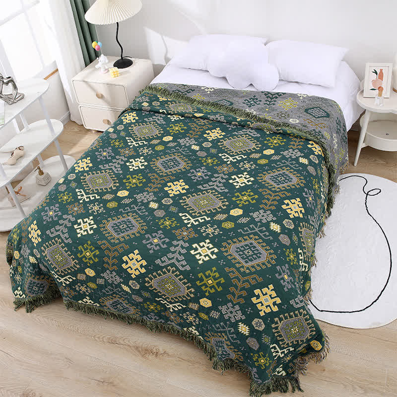 Couette rétro géométrique en gaze de coton avec pompons