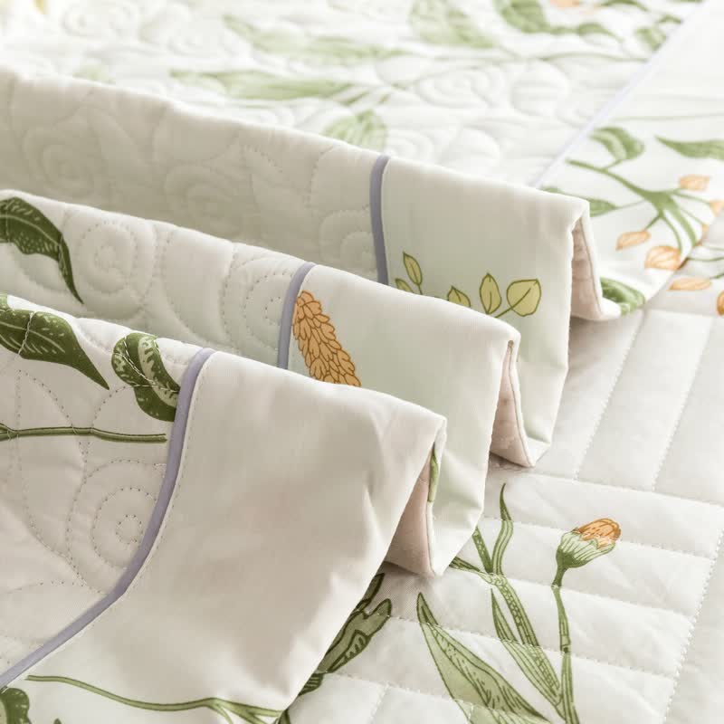 Linge de lit matelassé élégant en pur coton à motif floral