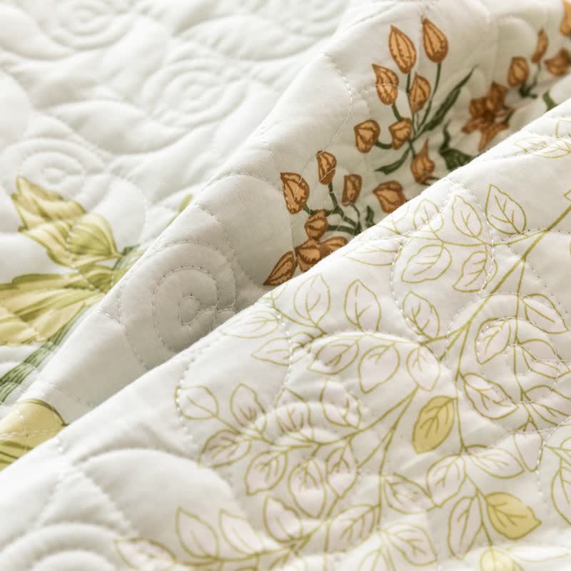 Linge de lit matelassé élégant en pur coton à motif floral
