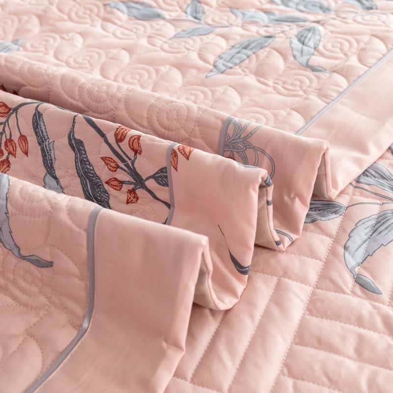 Linge de lit matelassé élégant en pur coton à motif floral