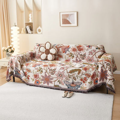 Housse de canapé douce avec motif floral rustique et pompons