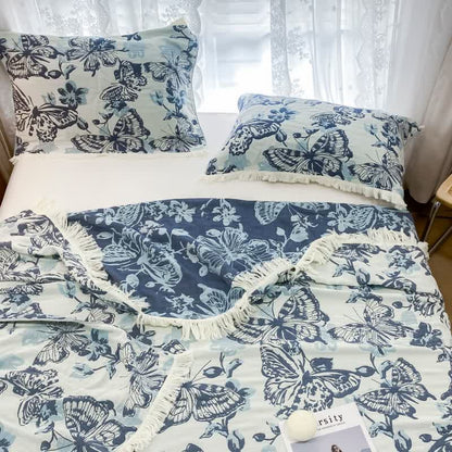 Couette légère à pompons et motif papillon en gaze de coton