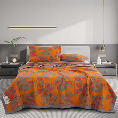 Couette réversible en gaze de coton jacquard à motif floral
