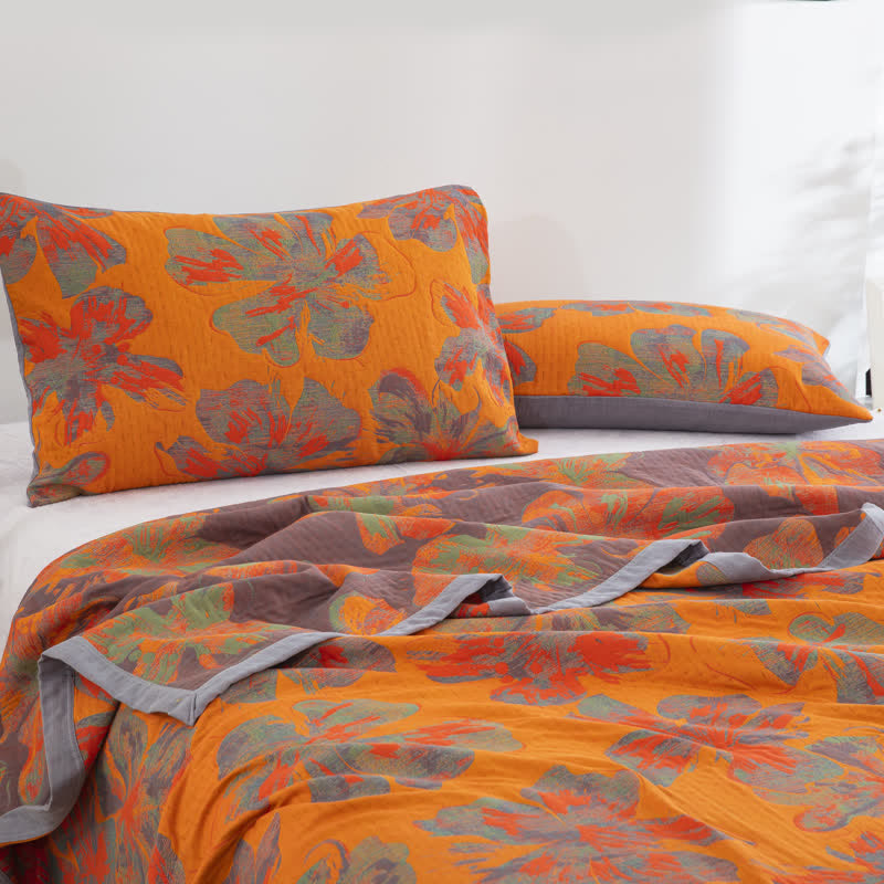 Couette réversible en gaze de coton jacquard à motif floral
