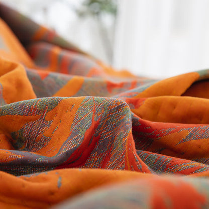 Couette réversible en gaze de coton jacquard à motif floral