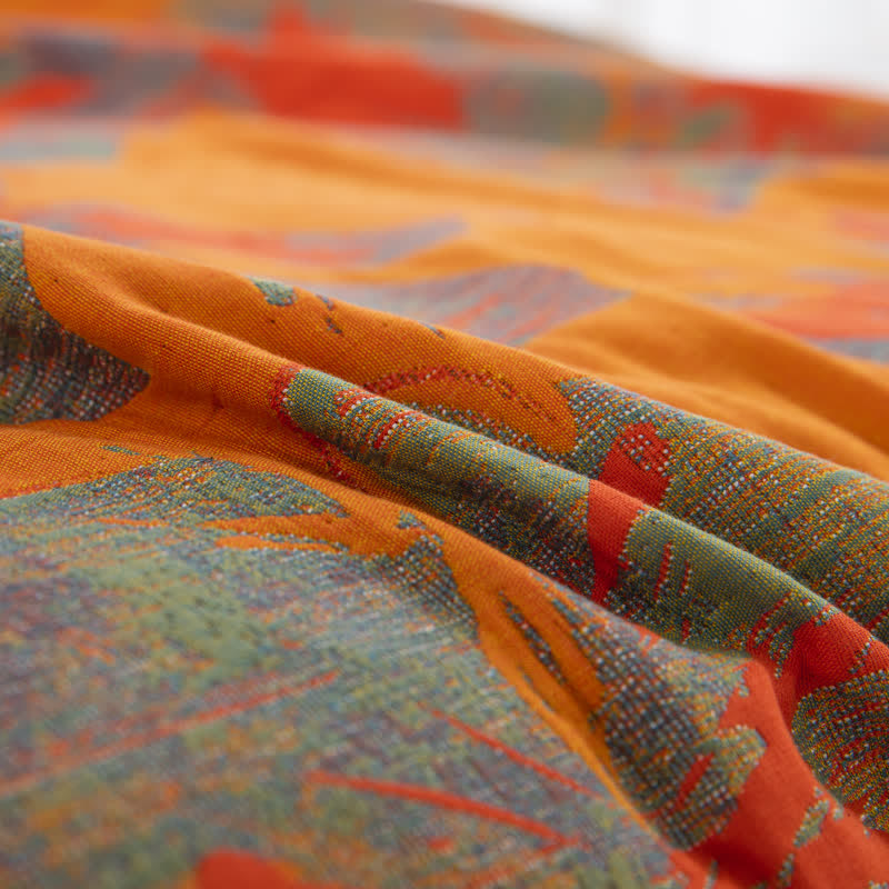Couette réversible en gaze de coton jacquard à motif floral