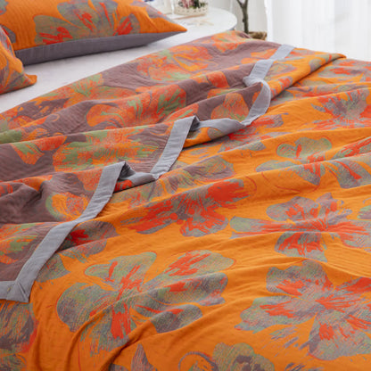 Couette réversible en gaze de coton jacquard à motif floral