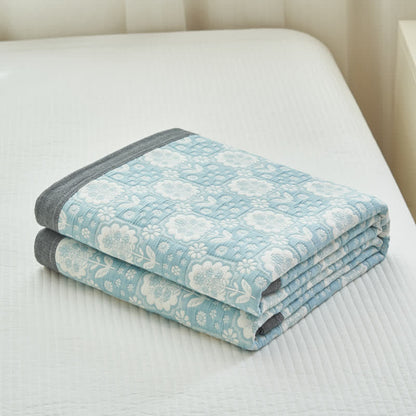 Couette en gaze de coton douce avec motif floral d'été