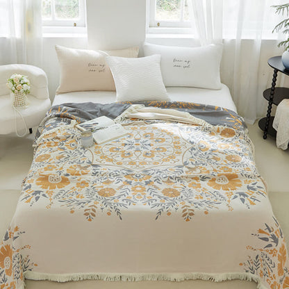 Couette double face en gaze de coton à motif floral jacquard