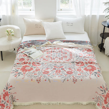 Couette double face en gaze de coton à motif floral jacquard