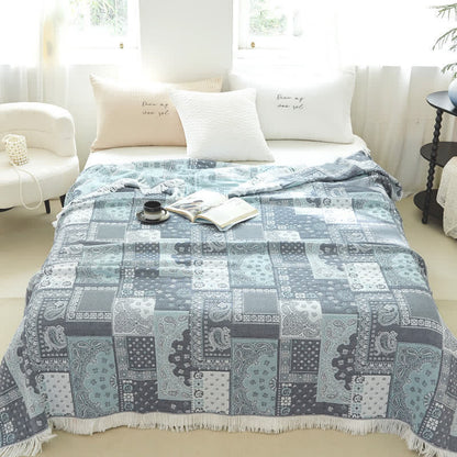 Couverture d'été respirante en gaze de coton avec pompons