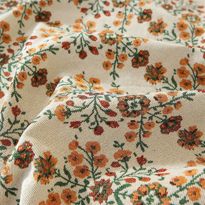 Housse de canapé jacquard à volants en fleurs de prunier