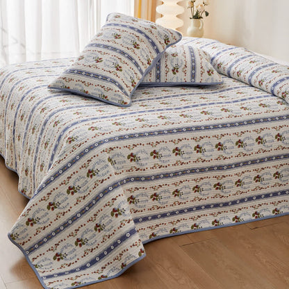 Linge de lit matelassé en pur coton avec un motif floral frais