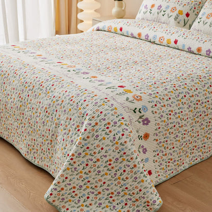 Linge de lit matelassé en pur coton avec des motifs floraux colorés