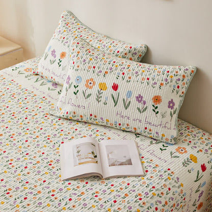 Linge de lit matelassé en pur coton avec des motifs floraux colorés