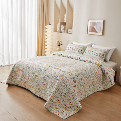 Linge de lit matelassé en pur coton avec des motifs floraux colorés
