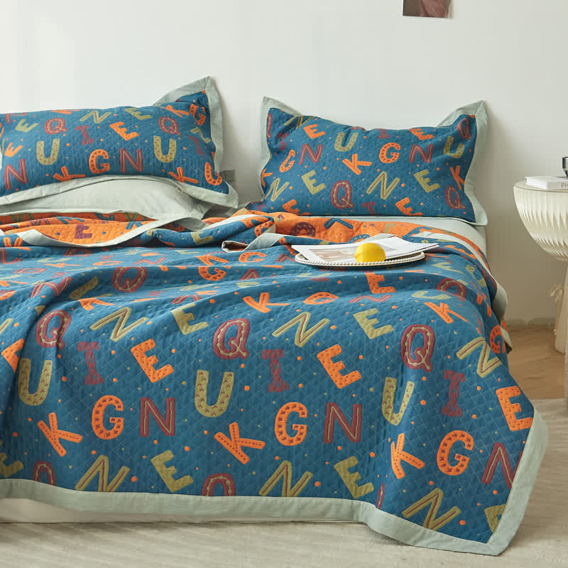 Couette réversible à trois couches en gaze de coton avec lettres