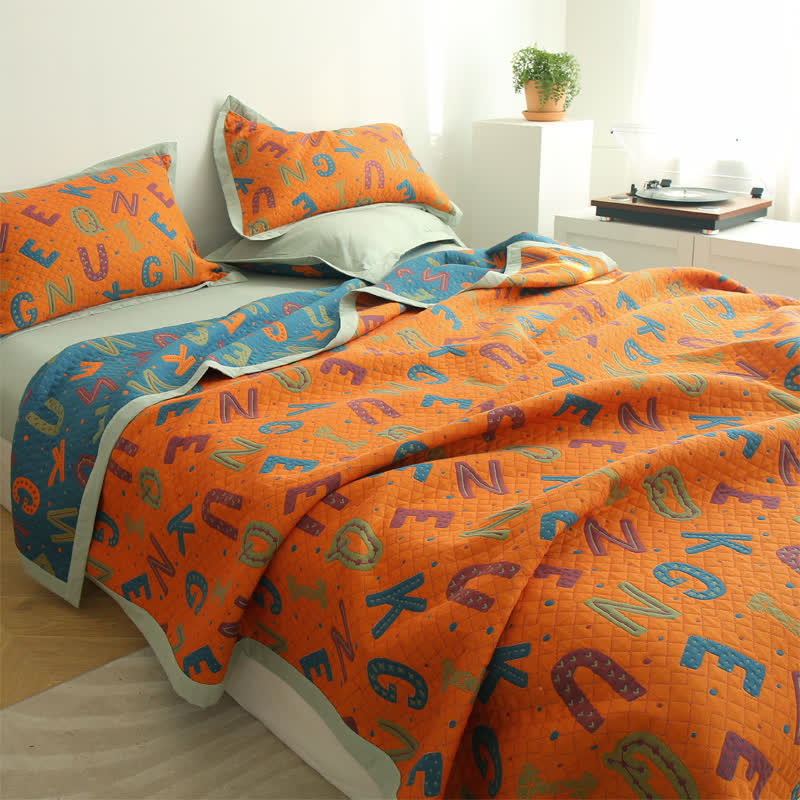 Couette réversible à trois couches en gaze de coton avec lettres