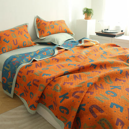 Couette réversible à trois couches en gaze de coton avec lettres