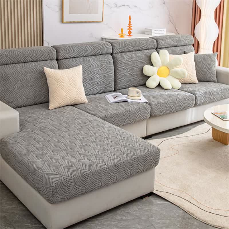 Housse de canapé jacquard unie avec structure en feuilles