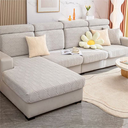 Housse de canapé jacquard unie avec structure en feuilles