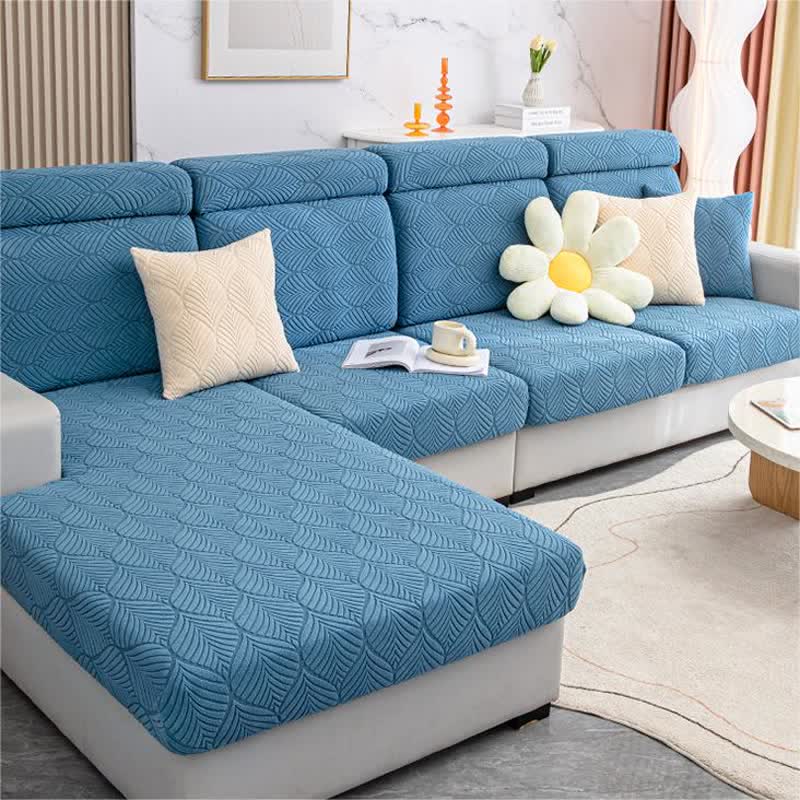 Housse de canapé jacquard unie avec structure en feuilles