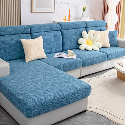 Housse de canapé jacquard unie avec structure en feuilles