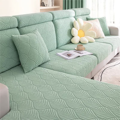Housse de canapé jacquard unie avec structure en feuilles