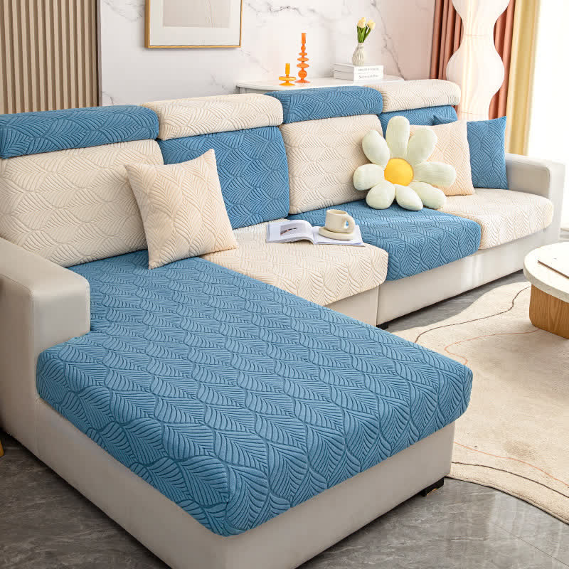 Housse de canapé jacquard unie avec structure en feuilles