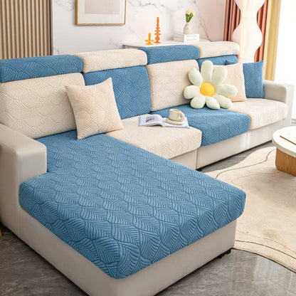 Housse de canapé jacquard unie avec structure en feuilles