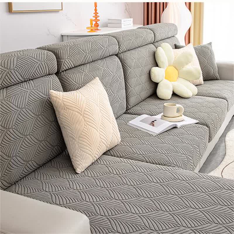 Housse de canapé jacquard unie avec structure en feuilles