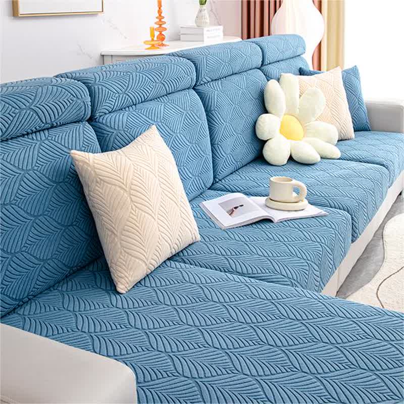 Housse de canapé jacquard unie avec structure en feuilles
