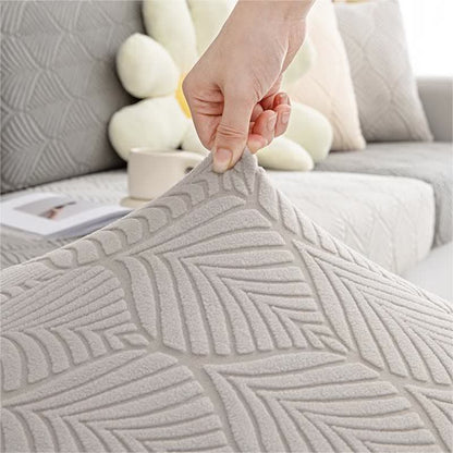 Housse de canapé jacquard unie avec structure en feuilles