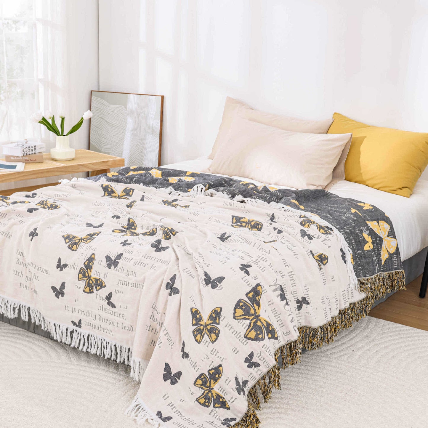 Couette jacquard en gaze de coton avec pompons papillons