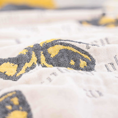Couette jacquard en gaze de coton avec pompons papillons