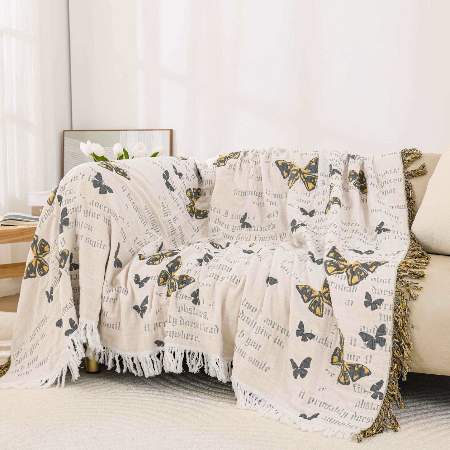 Couette jacquard en gaze de coton avec pompons papillons