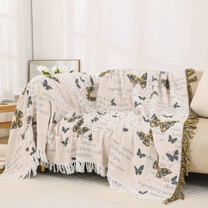 Couette jacquard en gaze de coton avec pompons papillons
