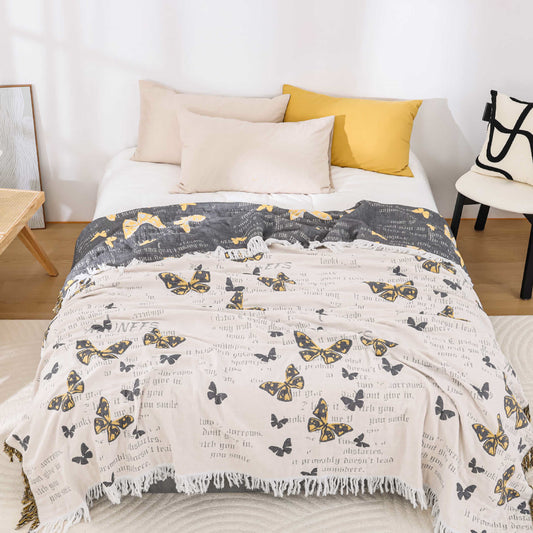 Couette jacquard en gaze de coton avec pompons papillons