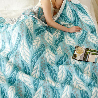 Couette respirante en fibres de bambou avec des feuilles luxuriantes