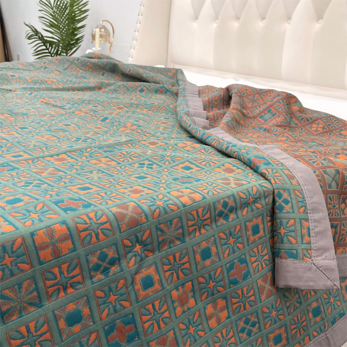 Couette réversible en pur coton à carreaux et motif floral