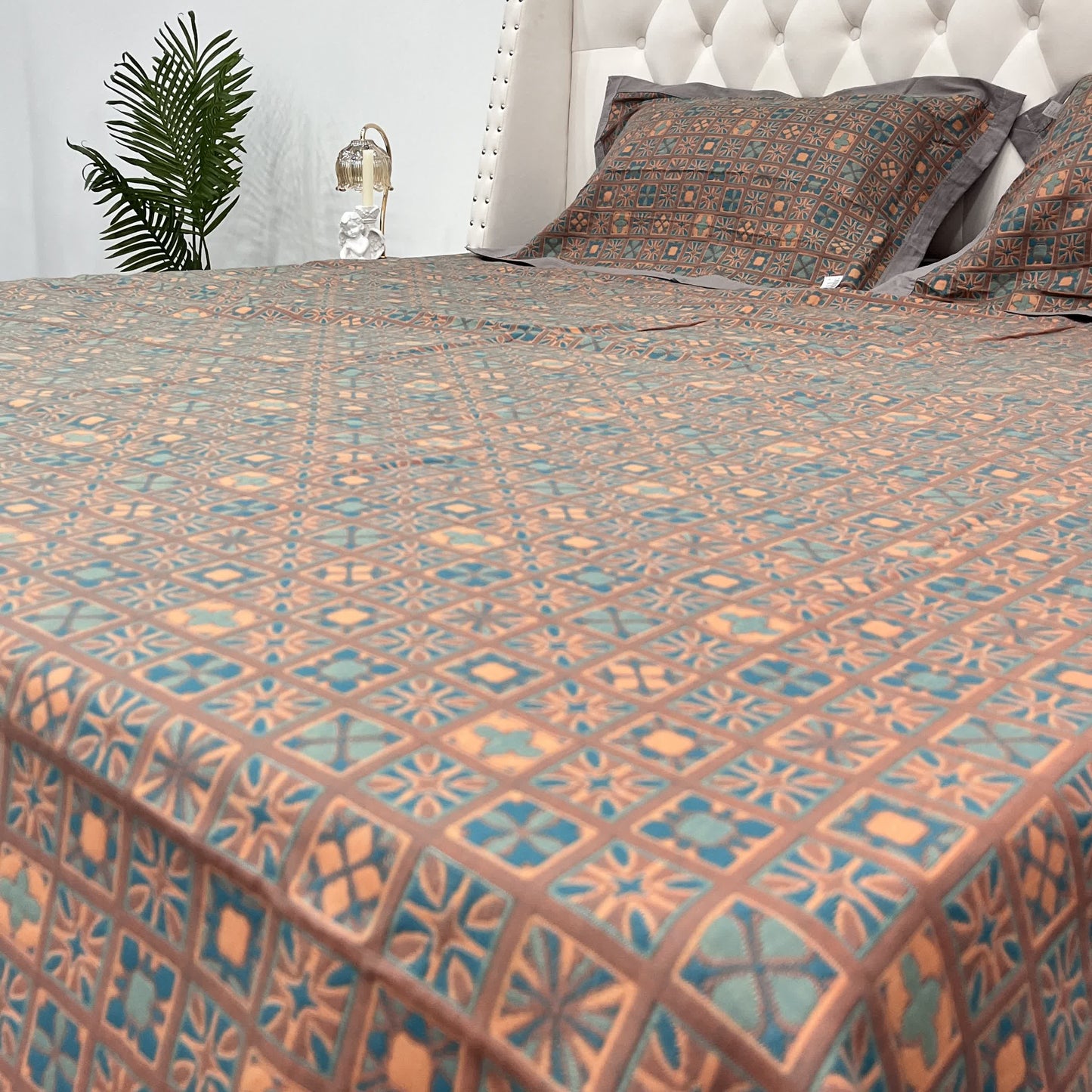 Couette réversible en pur coton à carreaux et motif floral