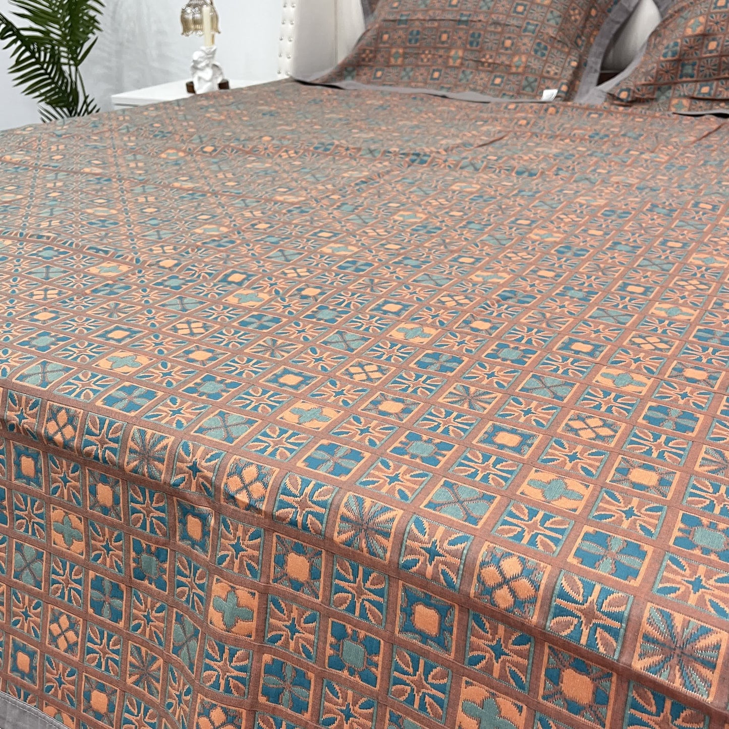 Couette réversible en pur coton à carreaux et motif floral