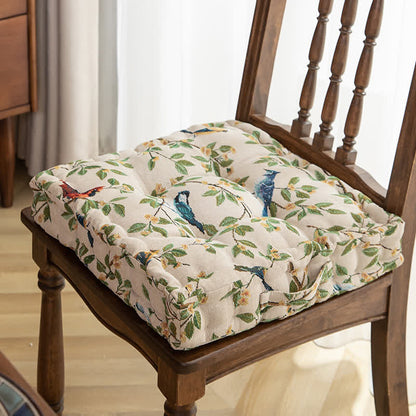 Coussin de chaise et de sol en jacquard motif feuilles d'oiseaux