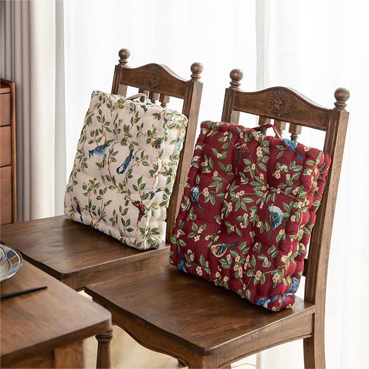 Coussin de chaise et de sol en jacquard motif feuilles d'oiseaux
