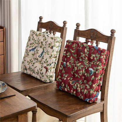 Coussin de chaise et de sol en jacquard motif feuilles d'oiseaux