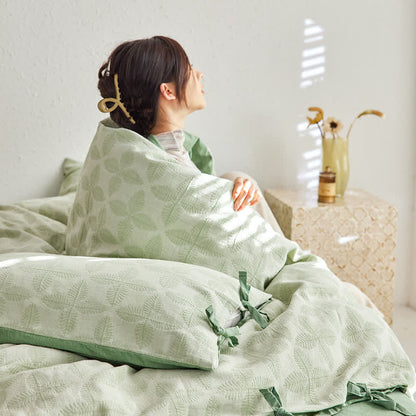 Parure de lit en gaze de coton avec lien jacquard (4 pièces)