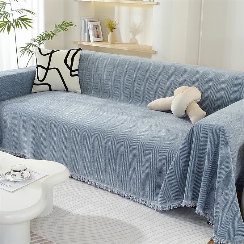 Housse de canapé en chenille avec motif à chevrons et pompons