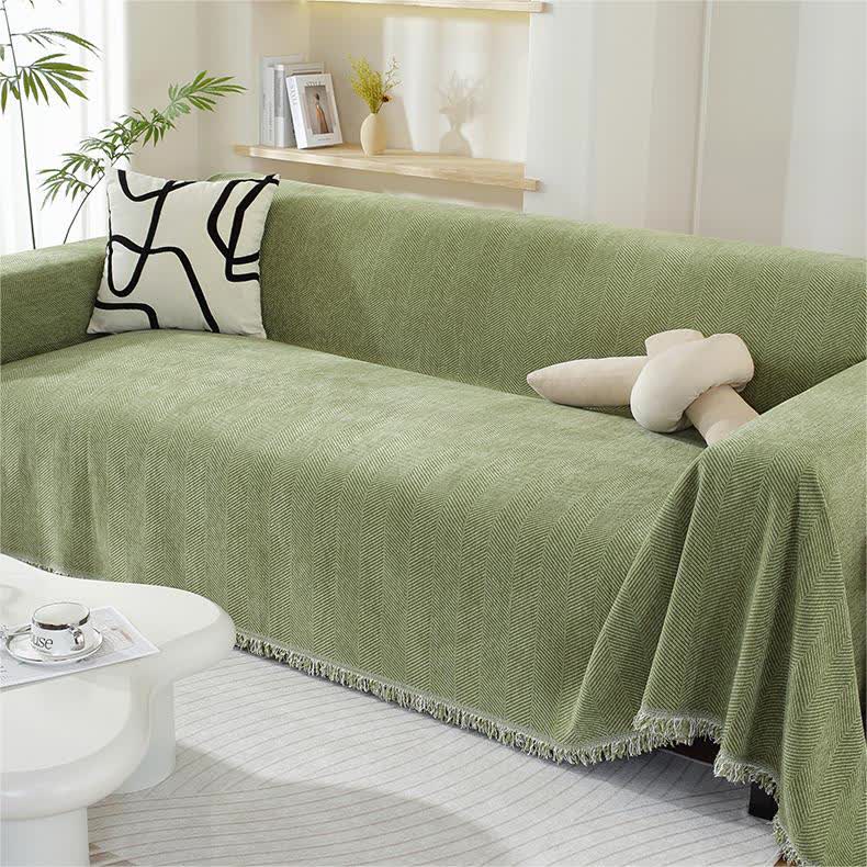 Housse de canapé en chenille avec motif à chevrons et pompons