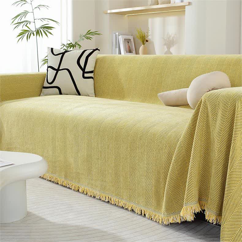 Housse de canapé en chenille avec motif à chevrons et pompons